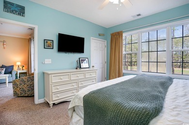 Two-bedroom two bath fully furnished second floor end unit in on Barefoot Resort and Golf Club  in South Carolina - for sale on GolfHomes.com, golf home, golf lot