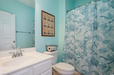 Two-bedroom two bath fully furnished second floor end unit in on Barefoot Resort and Golf Club  in South Carolina - for sale on GolfHomes.com, golf home, golf lot