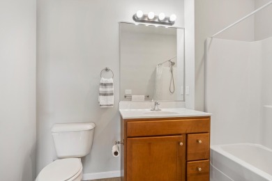 Looking for a first-floor condo with an attached garage that on Stone Creek Golf Club in Illinois - for sale on GolfHomes.com, golf home, golf lot