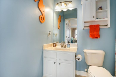 Two-bedroom two bath fully furnished second floor end unit in on Barefoot Resort and Golf Club  in South Carolina - for sale on GolfHomes.com, golf home, golf lot