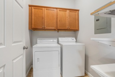 Looking for a first-floor condo with an attached garage that on Stone Creek Golf Club in Illinois - for sale on GolfHomes.com, golf home, golf lot