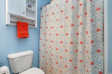 Two-bedroom two bath fully furnished second floor end unit in on Barefoot Resort and Golf Club  in South Carolina - for sale on GolfHomes.com, golf home, golf lot