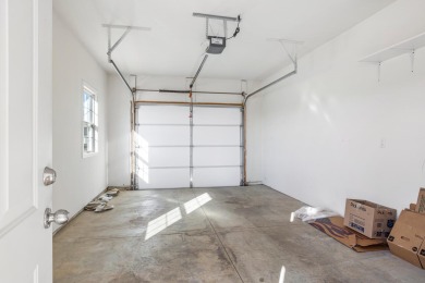 Looking for a first-floor condo with an attached garage that on Stone Creek Golf Club in Illinois - for sale on GolfHomes.com, golf home, golf lot