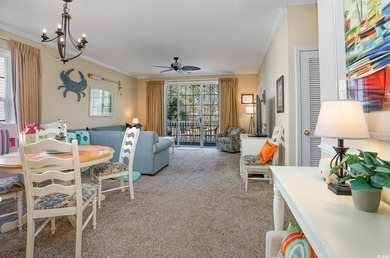 Two-bedroom two bath fully furnished second floor end unit in on Barefoot Resort and Golf Club  in South Carolina - for sale on GolfHomes.com, golf home, golf lot