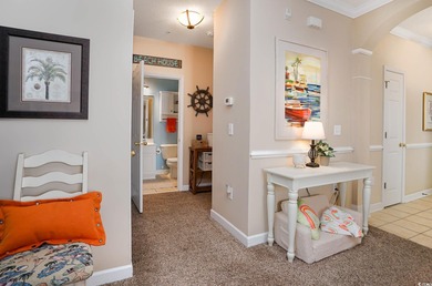 Two-bedroom two bath fully furnished second floor end unit in on Barefoot Resort and Golf Club  in South Carolina - for sale on GolfHomes.com, golf home, golf lot