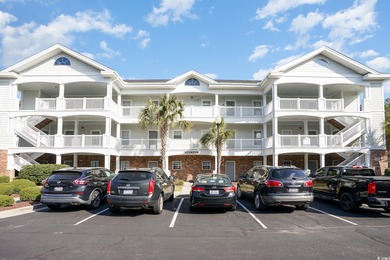 Two-bedroom two bath fully furnished second floor end unit in on Barefoot Resort and Golf Club  in South Carolina - for sale on GolfHomes.com, golf home, golf lot