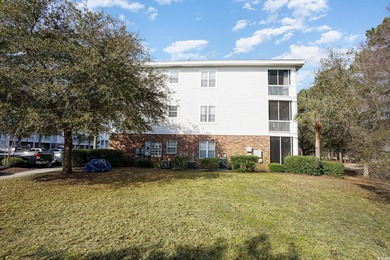 Two-bedroom two bath fully furnished second floor end unit in on Barefoot Resort and Golf Club  in South Carolina - for sale on GolfHomes.com, golf home, golf lot