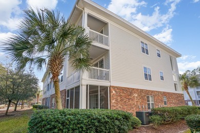 Two-bedroom two bath fully furnished second floor end unit in on Barefoot Resort and Golf Club  in South Carolina - for sale on GolfHomes.com, golf home, golf lot