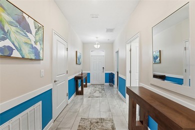 Overhauled by  Superhosts and designed for five-star stays -- on The Oasis Club at Champions Gate in Florida - for sale on GolfHomes.com, golf home, golf lot