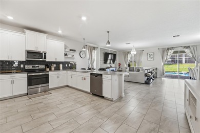 Overhauled by  Superhosts and designed for five-star stays -- on The Oasis Club at Champions Gate in Florida - for sale on GolfHomes.com, golf home, golf lot