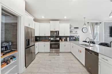 Overhauled by  Superhosts and designed for five-star stays -- on The Oasis Club at Champions Gate in Florida - for sale on GolfHomes.com, golf home, golf lot