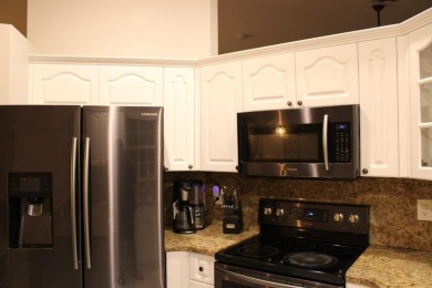 Spacious 4BR/2.5BA single-family home with 2-car garage in on The Carolina Club in Florida - for sale on GolfHomes.com, golf home, golf lot