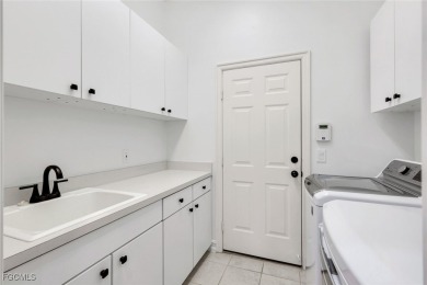 Welcome to this beautifully updated 3-bedroom, 2-bath, 2-car on Gateway Golf and Country Club in Florida - for sale on GolfHomes.com, golf home, golf lot