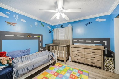 Spacious 4BR/2.5BA single-family home with 2-car garage in on The Carolina Club in Florida - for sale on GolfHomes.com, golf home, golf lot