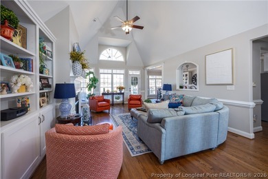 This beautifully updated custom brick home is located on Hole #1 on Sandy Ridge Country Club in North Carolina - for sale on GolfHomes.com, golf home, golf lot