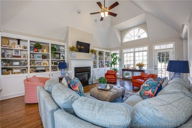 This beautifully updated custom brick home is located on Hole #1 on Sandy Ridge Country Club in North Carolina - for sale on GolfHomes.com, golf home, golf lot