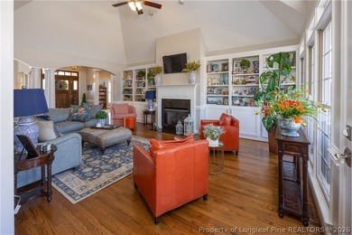 This beautifully updated custom brick home is located on Hole #1 on Sandy Ridge Country Club in North Carolina - for sale on GolfHomes.com, golf home, golf lot