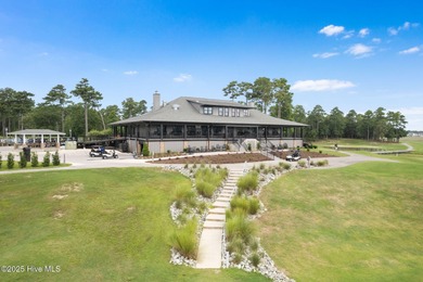 This quiet lot is tucked away on a cul-de-sac in the prestigious on Rivers Edge Golf Club in North Carolina - for sale on GolfHomes.com, golf home, golf lot