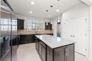 Under contract-accepting backup offers. PRICE REDUCTION - on Sarasota National Golf Club in Florida - for sale on GolfHomes.com, golf home, golf lot