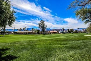 Custom home located on the par 5, 4th hole, of the Lake Nine at on Bermuda Dunes Country Club in California - for sale on GolfHomes.com, golf home, golf lot