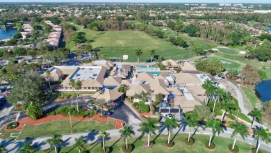 This beautiful 2nd-floor corner unit in Fairways Green, Boca on Boca Lago Golf and Country Club in Florida - for sale on GolfHomes.com, golf home, golf lot