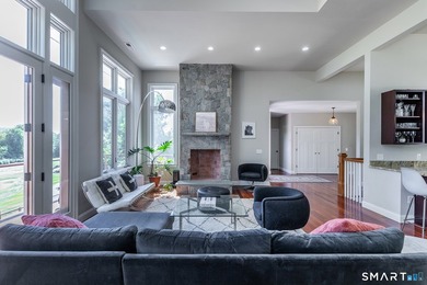 A spacious contemporary located in a resort quality setting on The Club at River Oaks in Connecticut - for sale on GolfHomes.com, golf home, golf lot