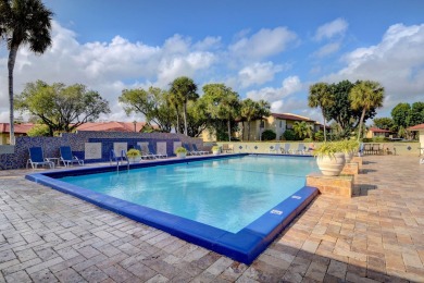 This beautiful 2nd-floor corner unit in Fairways Green, Boca on Boca Lago Golf and Country Club in Florida - for sale on GolfHomes.com, golf home, golf lot