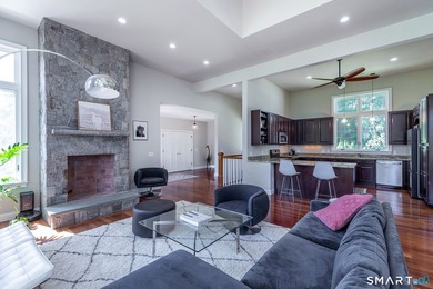 A spacious contemporary located in a resort quality setting on The Club at River Oaks in Connecticut - for sale on GolfHomes.com, golf home, golf lot