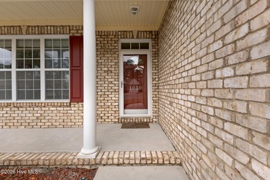 Well-maintained all brick home with mature landscaping offers on Magnolia Greens Golf Plantation in North Carolina - for sale on GolfHomes.com, golf home, golf lot