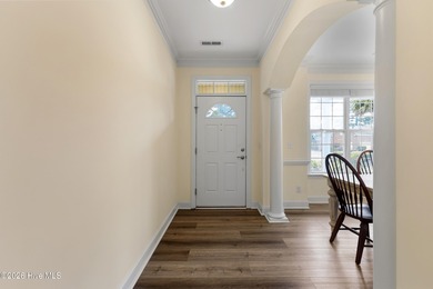 Well-maintained all brick home with mature landscaping offers on Magnolia Greens Golf Plantation in North Carolina - for sale on GolfHomes.com, golf home, golf lot