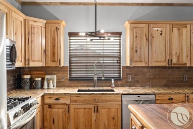 Discover mountain living at its finest in this spacious home on Red Lodge Golf Club in Montana - for sale on GolfHomes.com, golf home, golf lot