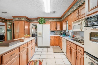 ARROWHEAD BEAUTY with 4 bedrooms, 2.5 baths and Golf Course on Arrowhead Country Club in Alabama - for sale on GolfHomes.com, golf home, golf lot