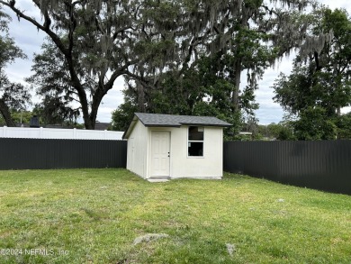 The backyard offers plenty of space for a boat or Rv, outdoor on San Jose Country Club in Florida - for sale on GolfHomes.com, golf home, golf lot