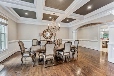 Positioned on a quiet cul-de-sac overlooking the 17th green on TPC At Sugarloaf Golf Club in Georgia - for sale on GolfHomes.com, golf home, golf lot