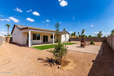Feel right at home in this beautifully maintained 3-bedroom on Arizona City Golf Club in Arizona - for sale on GolfHomes.com, golf home, golf lot