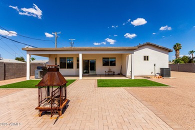 Feel right at home in this beautifully maintained 3-bedroom on Arizona City Golf Club in Arizona - for sale on GolfHomes.com, golf home, golf lot