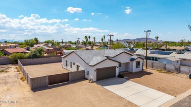 Feel right at home in this beautifully maintained 3-bedroom on Arizona City Golf Club in Arizona - for sale on GolfHomes.com, golf home, golf lot