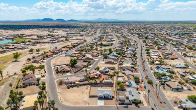 Feel right at home in this beautifully maintained 3-bedroom on Arizona City Golf Club in Arizona - for sale on GolfHomes.com, golf home, golf lot