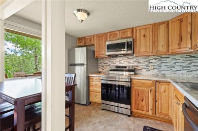 Beautifully updated 2-bedroom, 2-bath Hemlock Nob condo is on Sugar Mountain Golf Course in North Carolina - for sale on GolfHomes.com, golf home, golf lot