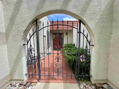 Welcome to 49 E Via Roma, a refined 2-bedroom, 3-bath townhome on Crestview Country Club in Kansas - for sale on GolfHomes.com, golf home, golf lot
