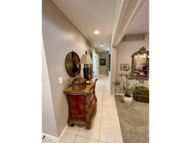 Welcome to 49 E Via Roma, a refined 2-bedroom, 3-bath townhome on Crestview Country Club in Kansas - for sale on GolfHomes.com, golf home, golf lot
