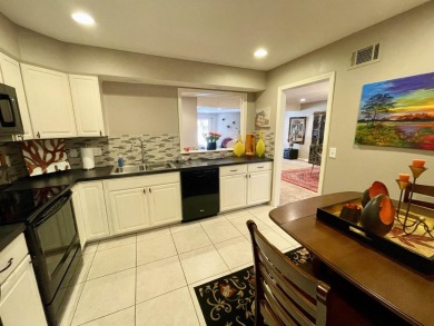Welcome to 49 E Via Roma, a refined 2-bedroom, 3-bath townhome on Crestview Country Club in Kansas - for sale on GolfHomes.com, golf home, golf lot