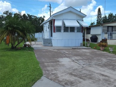 PET FRIENDLY, SINGLE WIDE MOBILE HOME IN ACTIVE 55+ COMMUNITY! on River Run Golf Links in Florida - for sale on GolfHomes.com, golf home, golf lot