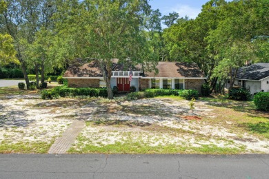 Spacious retreat home nestled on 1/3 acre corner lot is awaiting on Bluewater Bay Resort in Florida - for sale on GolfHomes.com, golf home, golf lot