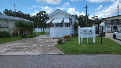 PET FRIENDLY, SINGLE WIDE MOBILE HOME IN ACTIVE 55+ COMMUNITY! on River Run Golf Links in Florida - for sale on GolfHomes.com, golf home, golf lot
