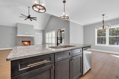 Nestled on the corner lot is an absolute gorgeous new on Canongate At Healy Point Country Club in Georgia - for sale on GolfHomes.com, golf home, golf lot