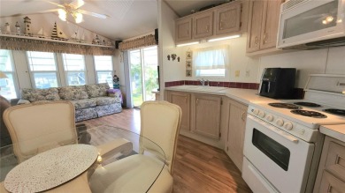 PET FRIENDLY, SINGLE WIDE MOBILE HOME IN ACTIVE 55+ COMMUNITY! on River Run Golf Links in Florida - for sale on GolfHomes.com, golf home, golf lot