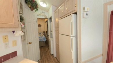 PET FRIENDLY, SINGLE WIDE MOBILE HOME IN ACTIVE 55+ COMMUNITY! on River Run Golf Links in Florida - for sale on GolfHomes.com, golf home, golf lot