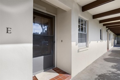 Tucked at the end of the road in Pinehurst Village, this on The Dunedin Country Club in Florida - for sale on GolfHomes.com, golf home, golf lot