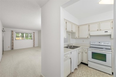 Tucked at the end of the road in Pinehurst Village, this on The Dunedin Country Club in Florida - for sale on GolfHomes.com, golf home, golf lot